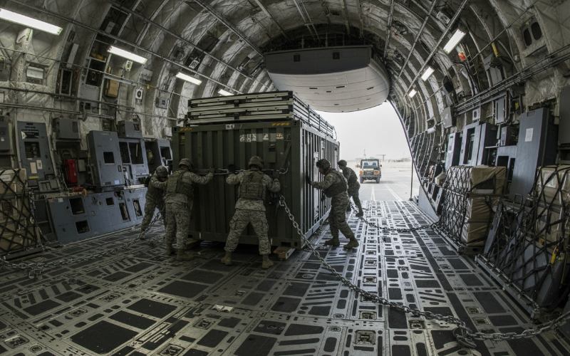 C-17 Globemaster III cargo ramp loading containerized solar system